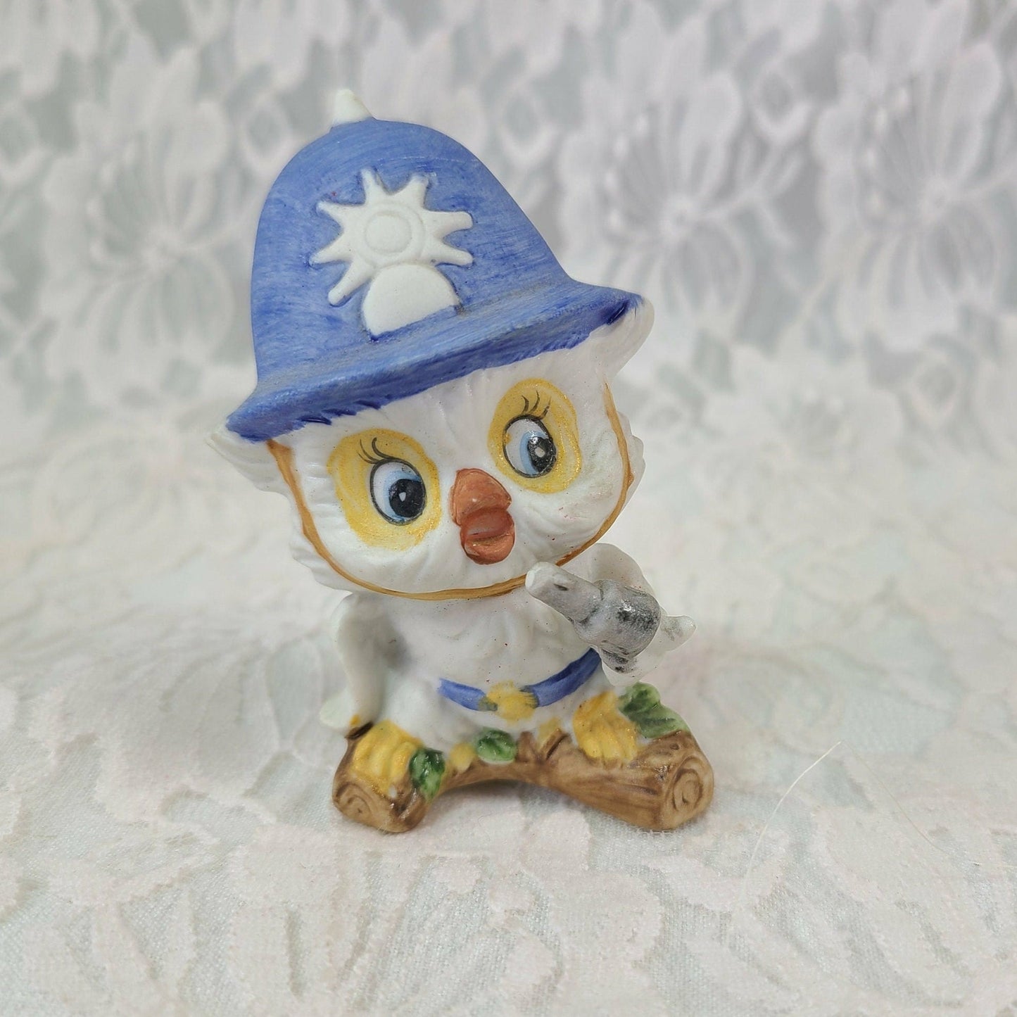 This is a wonderful little Vintage Bisque Porcelain Owl Figurine dressed as a London Bobby Beat Cop ~ Keystone Cop Owl with Pistol and Tall Bobby Cop Cap